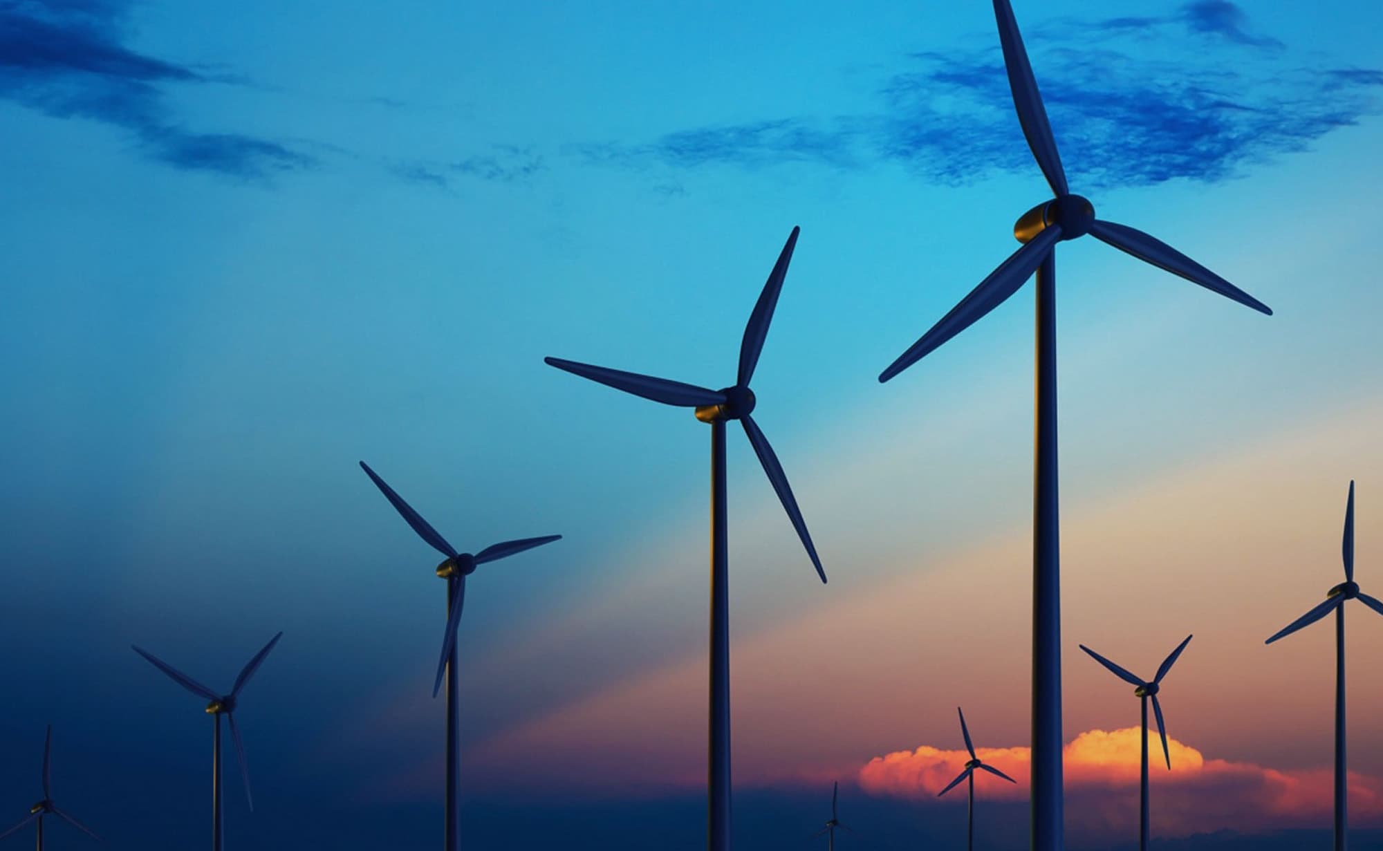 Wind turbines at sunset